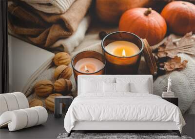 Two burning candles in the autumn interior Wall mural