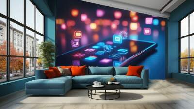 A smartphone lies on a table with glowing social media icons floating above it. Wall mural