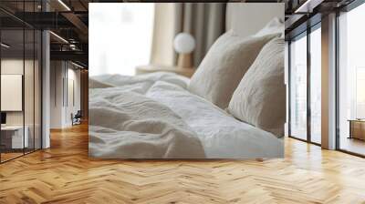 Close-up of a relaxing bedroom with natural linen textured bedding on the bed Wall mural