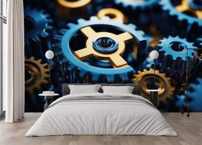 Close-up of interlocking gold and blue metal gears. Wall mural