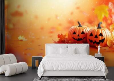 Two jack-o'-lanterns with carved faces, surrounded by autumn leaves on an orange background. Wall mural