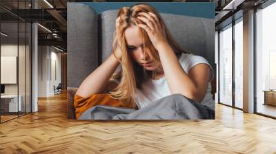 Mental health, Mental Health Awareness Week,stress, depression during quarantine,  lonely young woman in depression and stress on bed, negative emotions and mental health concept Wall mural