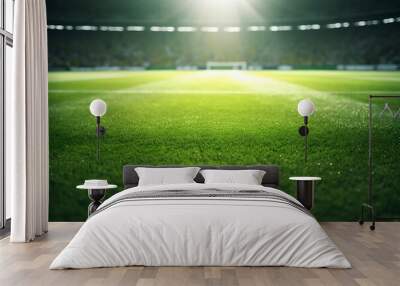 Soccer field with green grass and bright lights Wall mural