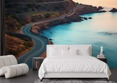 Winding road in the coast at sunset Wall mural