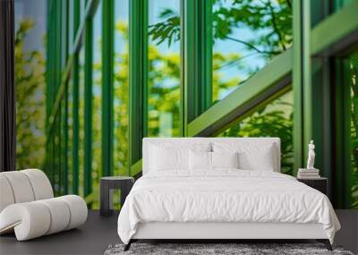 A closeup of green glass windows on an office building Wall mural