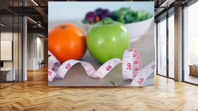 Salad of vegetables, oranges and apples for good health Wall mural