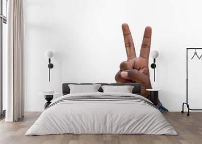 Hand of an African American kid showing peace gesture isolated against the white background Wall mural