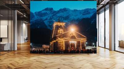 View of the Kedarnath temple lights at night with mountains in the background in Uttarakhand, India Wall mural