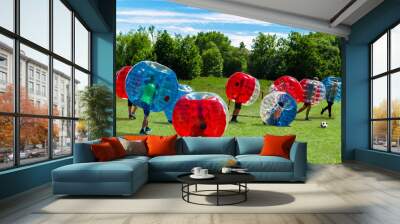  Children playing  in Bubble Football Wall mural