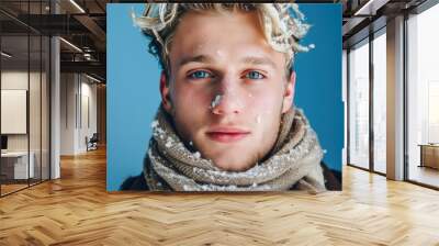 A young man with blonde hair and blue eyes is wearing a white scarf, generative ai image Wall mural