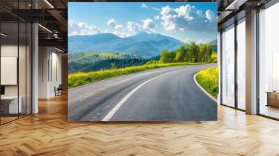 Empty highway in the middle of blooming hills, steep mountain peaks in the background, clear sunny day, bright rays, incredible nature, rich colors Wall mural