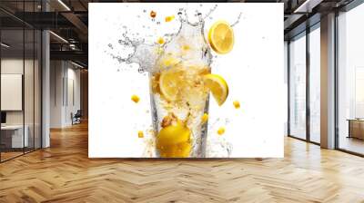 Tasty fresh juicy lemonade with lemons explode Wall mural