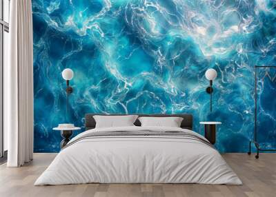 Aerial view of a turquoise, calm and crystal clear ocean. Blue water background in summertime Wall mural