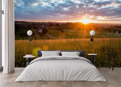 A nice scenic evening view over the rural european countryside with beautiful sundown.   Wall mural