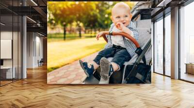 smiling happy beautiful little kid outdoors on summer day Wall mural