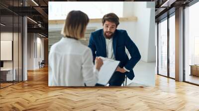 A man at a psychologist's appointment, communication, diagnosis of the problem, consultation Wall mural