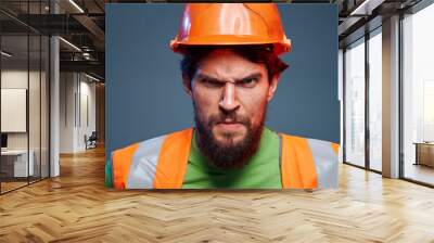 angry man in work uniform security professional hard work Wall mural