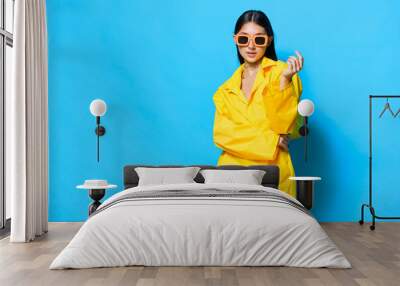 beautiful woman young yellow attractive girl sunglasses fashion happy trendy lifestyle Wall mural