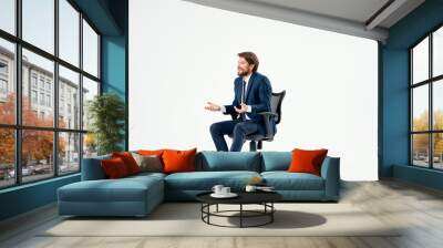 business man in a suit sitting in a chair emotions studio Wall mural