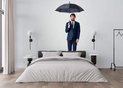 business man with an umbrella Wall mural