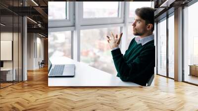 businessman working on laptop in office Wall mural