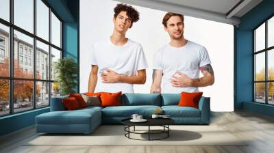 emotional two friends in white t-shirts yes fun studio Wall mural