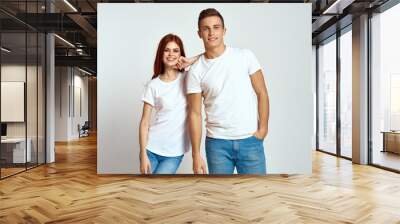 family couple in love jeans white t-shirt emotions fun man and woman having fun  Wall mural