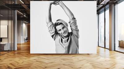 Guy in shirt portrait black and white photography light background gesticulate with hands Wall mural