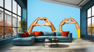 hands on blue sky Wall mural