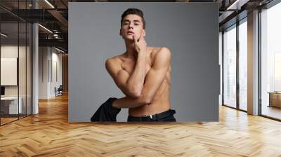 handsome male topless cuteness studio posing model Wall mural