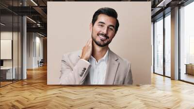 happy man beige handsome business grey copyspace businessman suit portrait smiling Wall mural