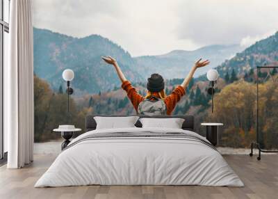 happy man with open arms raised Wall mural