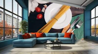 ingredients for making italian pasta plate with kitchen utensils lunch Wall mural