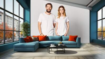 man and woman in white shirts Wall mural