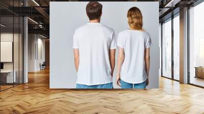 man and woman in white t-shirts communication fashion posing Wall mural