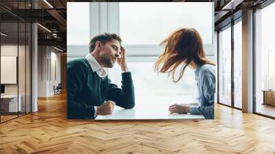 man and woman talking on the phone Wall mural