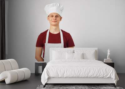 man in chef's clothes gesturing with his hands professional work Wall mural