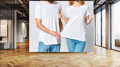 young couple in white t-shirts and jeans Design mockup Copy Space Wall mural