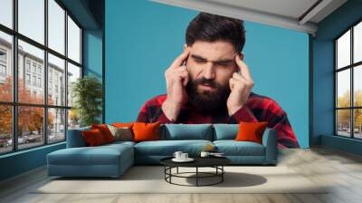 young man with headache Wall mural