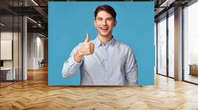 young man with thumb up Wall mural