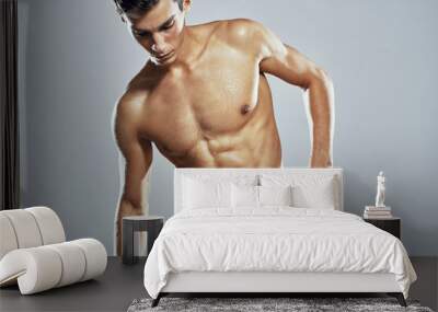 young muscular man Wall mural