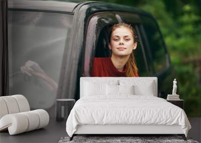 young woman in the car Wall mural