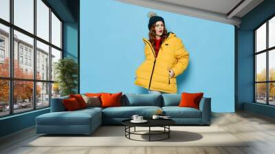 young woman in winter clothes Wall mural