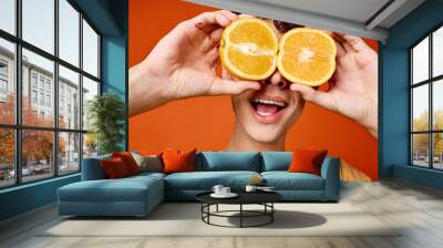 young woman with orange Wall mural