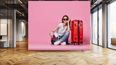 young woman with suitcase Wall mural