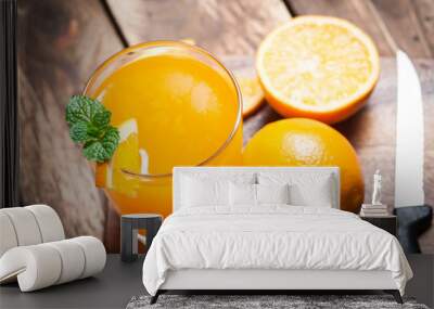 Fresh fruits Orange juice in glass on wood,Selective focus on gl Wall mural