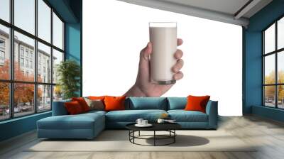 Hand holding glass of milk isolated on white background Wall mural