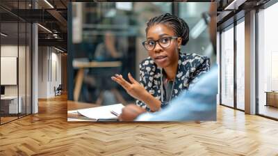 Businesswoman explaining business strategy during office meeting Wall mural