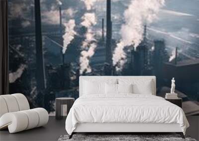 Heavy industrial factory releasing pollution into atmosphere Wall mural