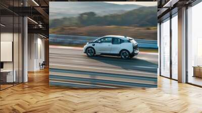 Modern white electric car driving fast on a racetrack Wall mural